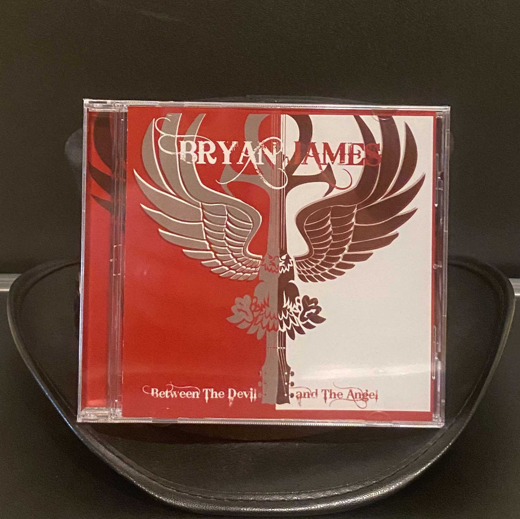 Between The Devil and The Angel - SIGNED HARD COPY CD